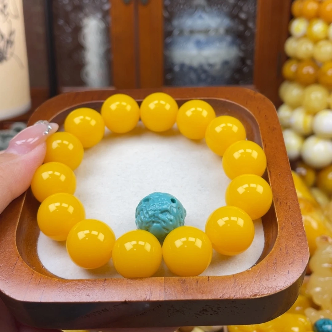 other其他（非贵金属类材质）16mm黄机油手串一条加龙珠配饰
