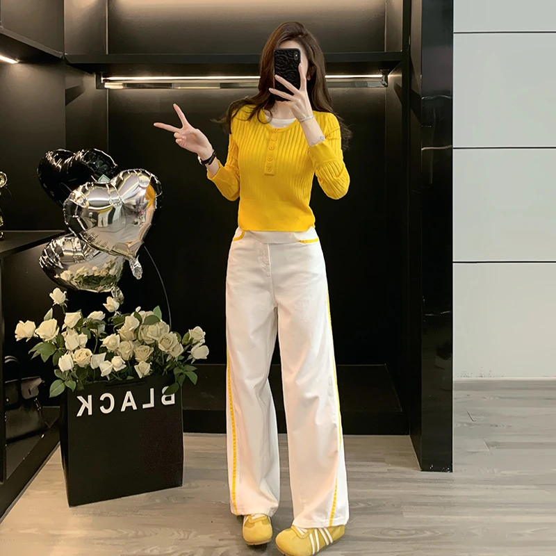 秋季套装女款爆款2025新款黄色假两件收腰长袖针织衫撞色牛仔裤潮