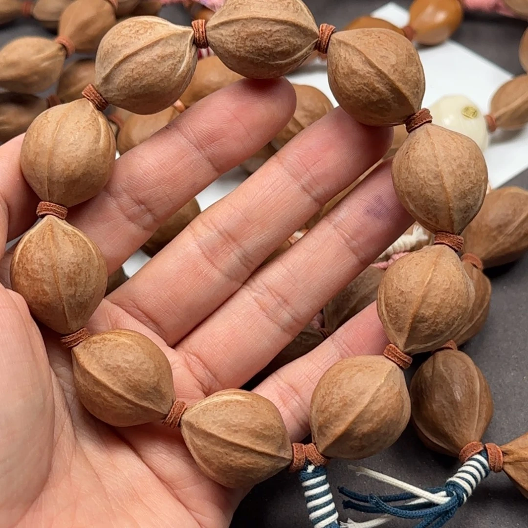 叁***耳橄榄核手串2.1✖️2.7头货