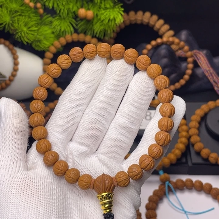 堃***困桃核吊坠玉龙脊1.0