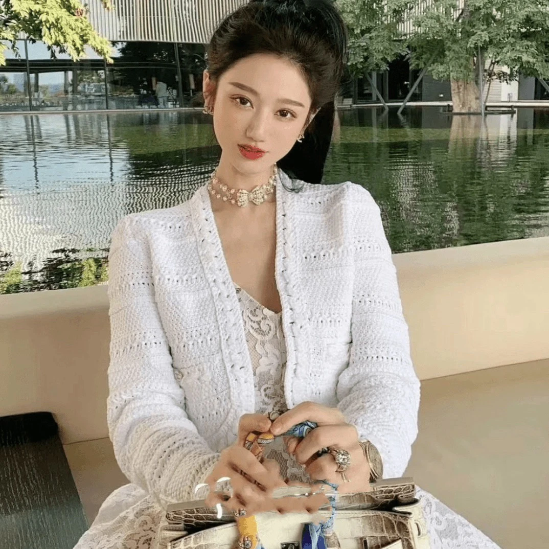 99新 Chanel/香奈儿 镂空V领长袖针织衫 36码 00013