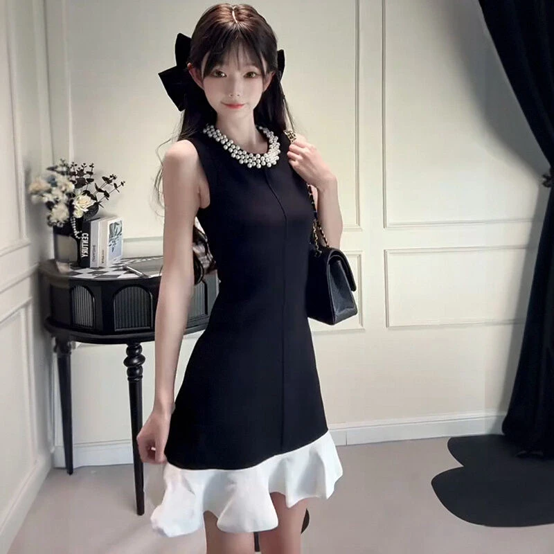 高级感气质重工珍珠领黑白拼色连衣裙女夏季新款赫本风荷叶边裙子