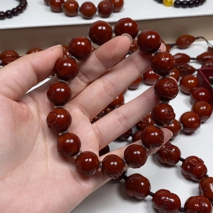 追***风橄榄核雕刻工艺的发展