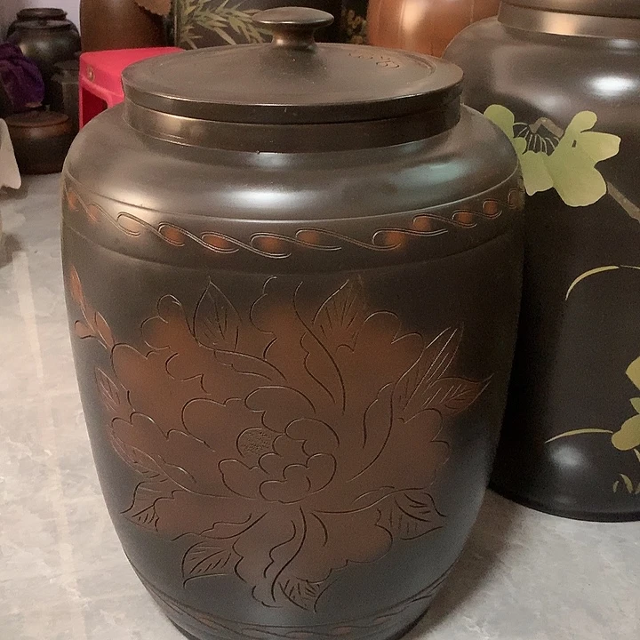 四号线雕牡丹茶缸。