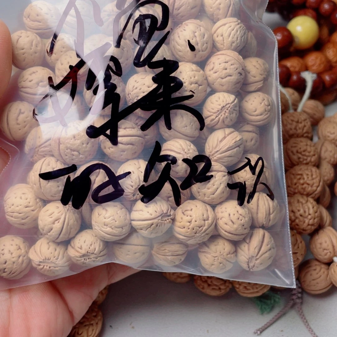 嫖***识手串桃核桃核散籽
