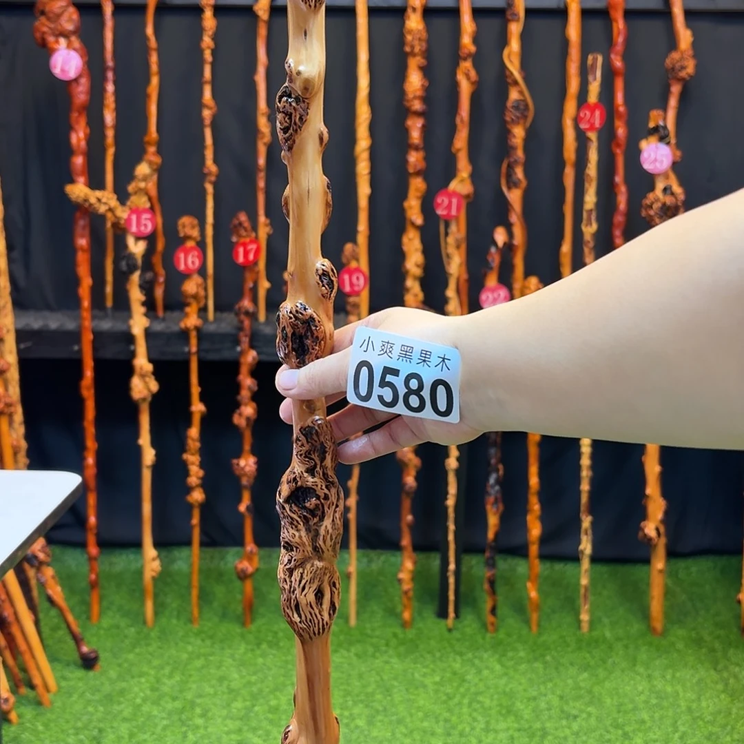 和***财黑果木拐杖手把件580