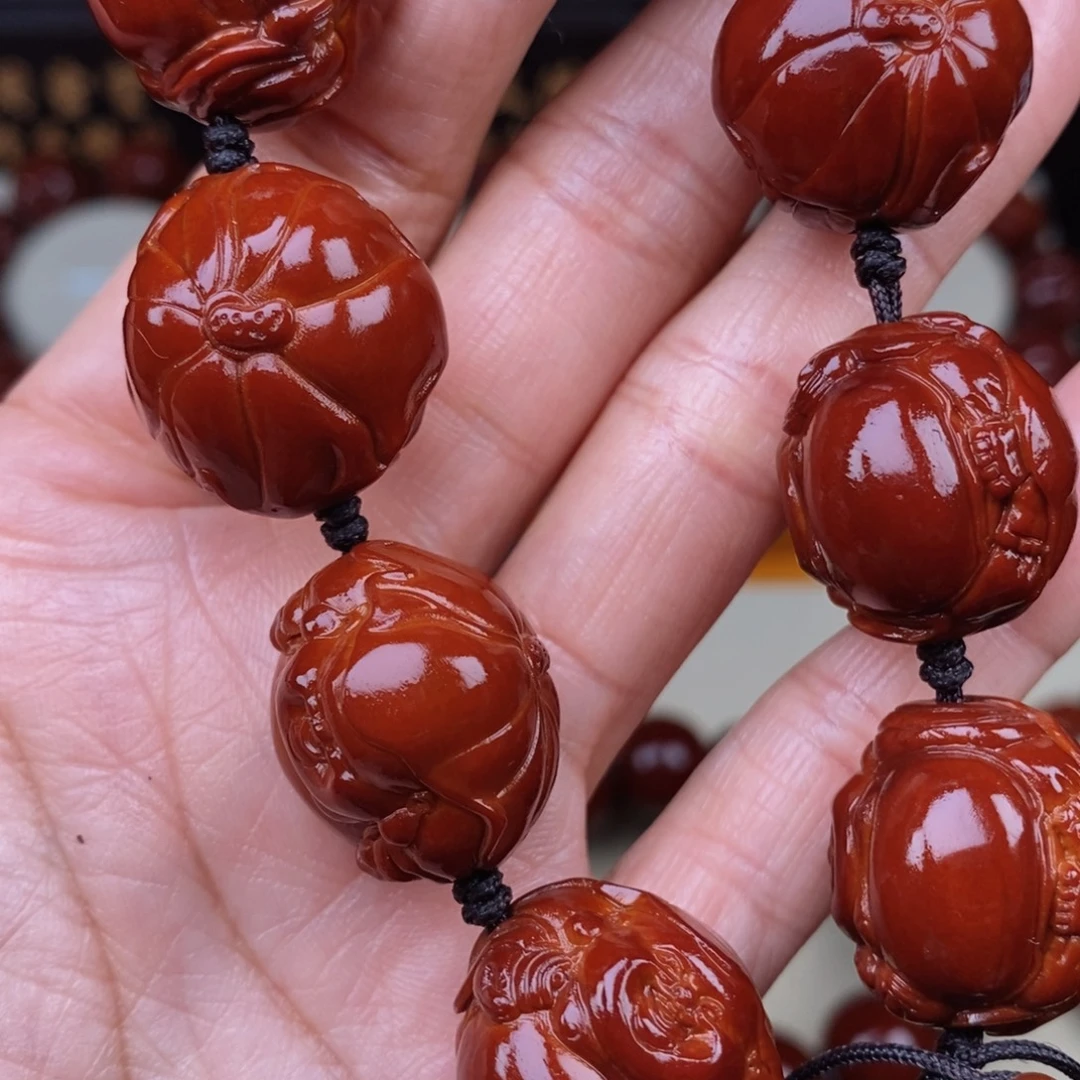 崔***哥吊坠橄榄核荷叶弥勒