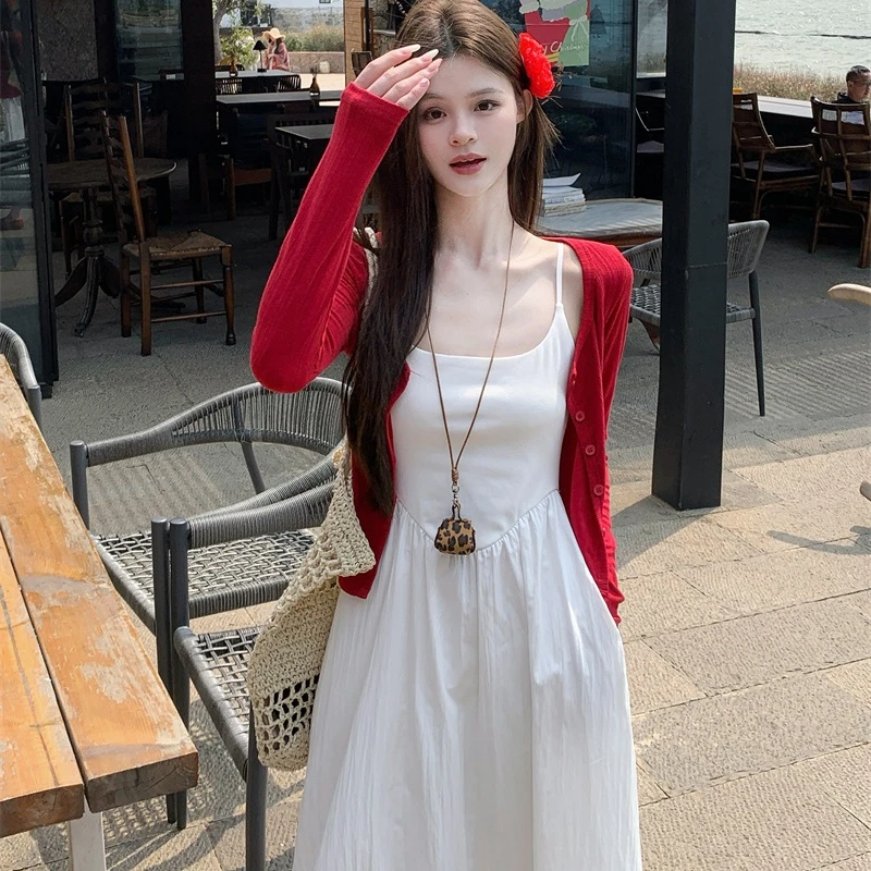 韩系高级感白色吊带连衣裙女夏季2025新款度假风收腰显瘦初恋长裙