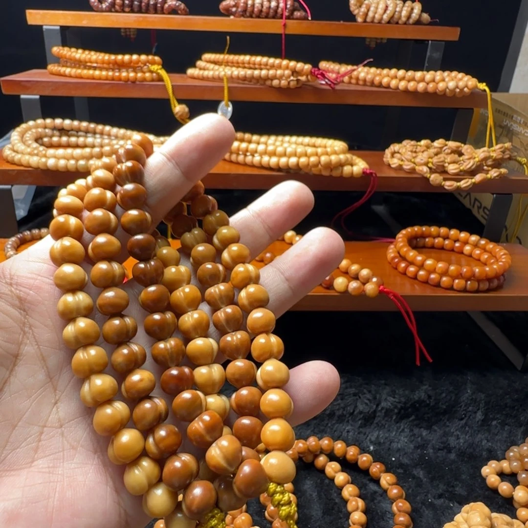 吊坠龙脊菩提屁桃手持卡9.6以上