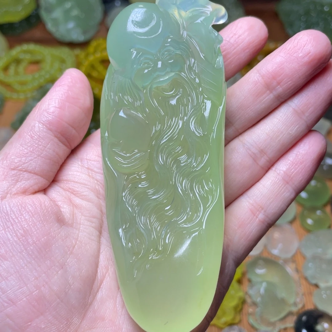 玥***霖蛇纹石玉未镶嵌手把件