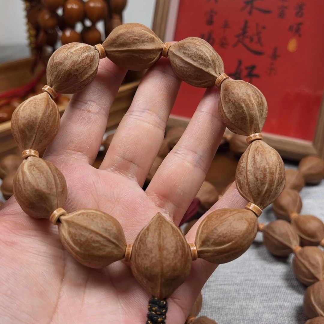 橄榄核手串狮**歌梅林铁核19.26橄榄核