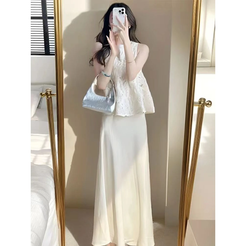 洋气减龄时尚套装搭配女夏季新款温柔风镂空上衣高腰半身裙两件套