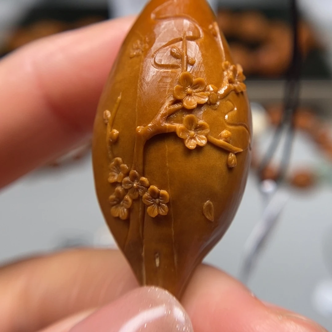 橄榄核吊坠梅花单子