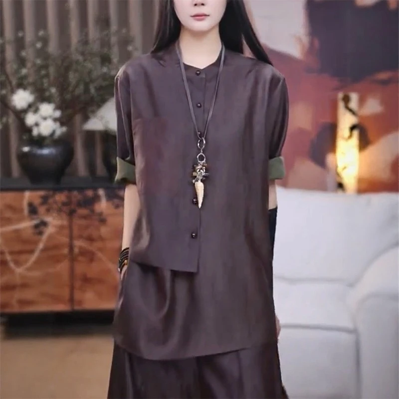 重工不规则设计排扣短袖衬衫年夏季新款欧货栗色时髦大码女装