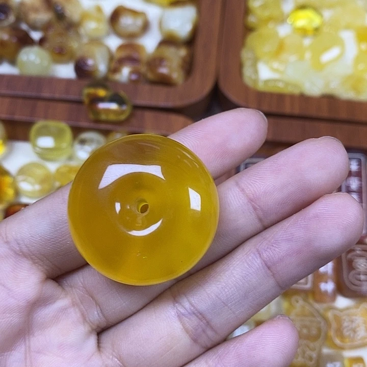 橄榄核吊坠高过平安扣
