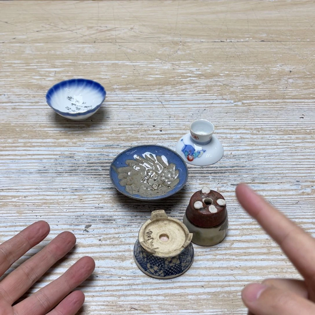 瓷片买**冷密密麻麻地排列着一个大