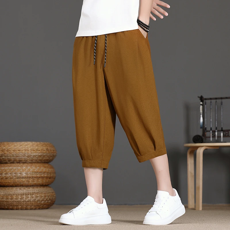 啄木鸟男士七分裤夏季薄款休闲冰丝短裤男生宽松潮流中裤哈伦裤子