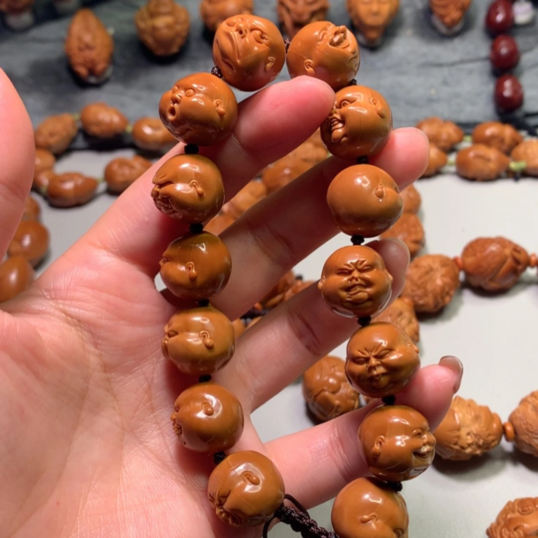 【闪购商品】橄榄核手串/手链抱**.百态人生