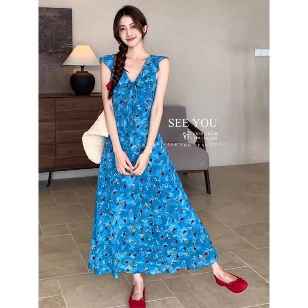 2025夏季新款法式油画连衣裙女夏荷叶边斜裁工艺蓝色雪纺碎花裙