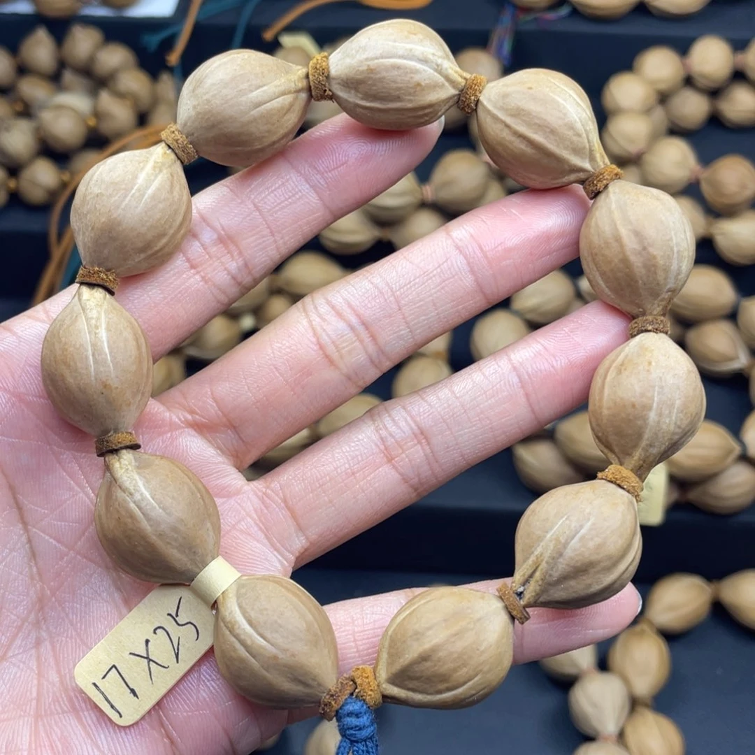 001橄榄核三花17*25