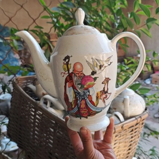 库存微瑕老寿星单孔水壶口失园