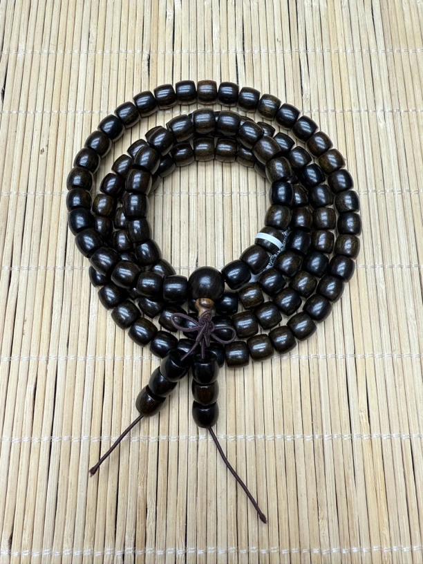 107沉木桶珠手串