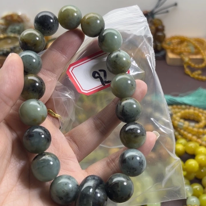哈***哈未镶嵌蛇纹石玉手链