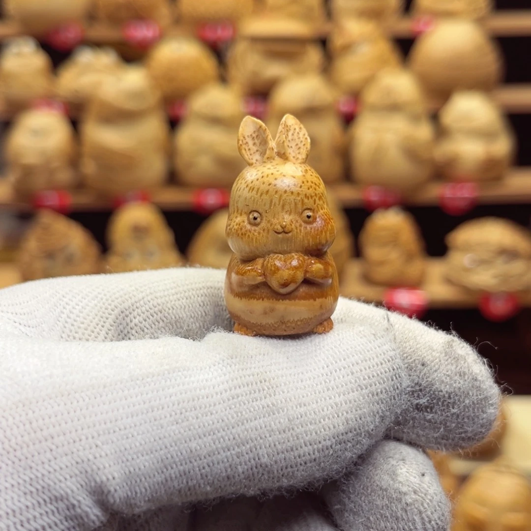 香榧木叶****秋竹根雕兔子手把件