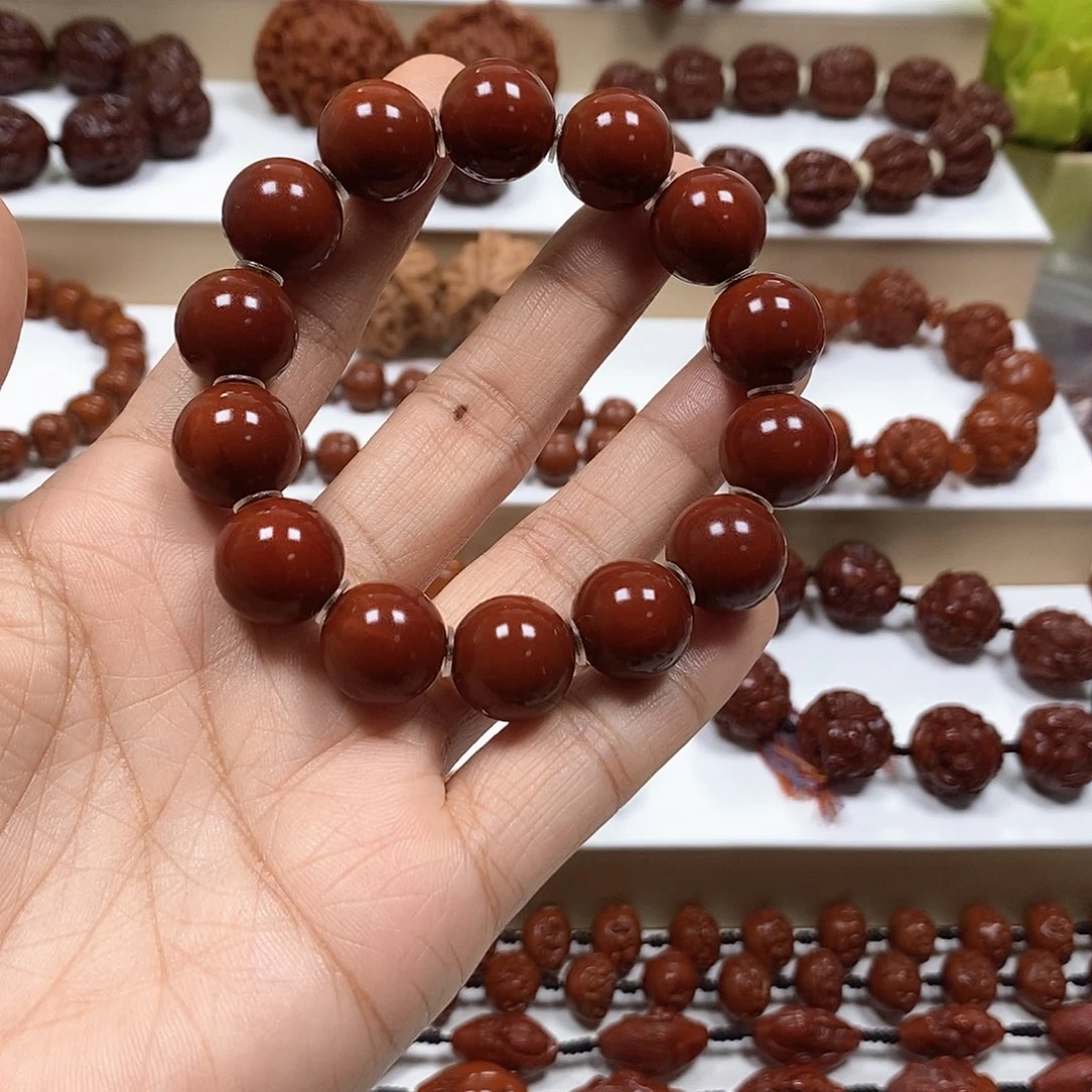 橄榄核吊坠别***膀橄榄核