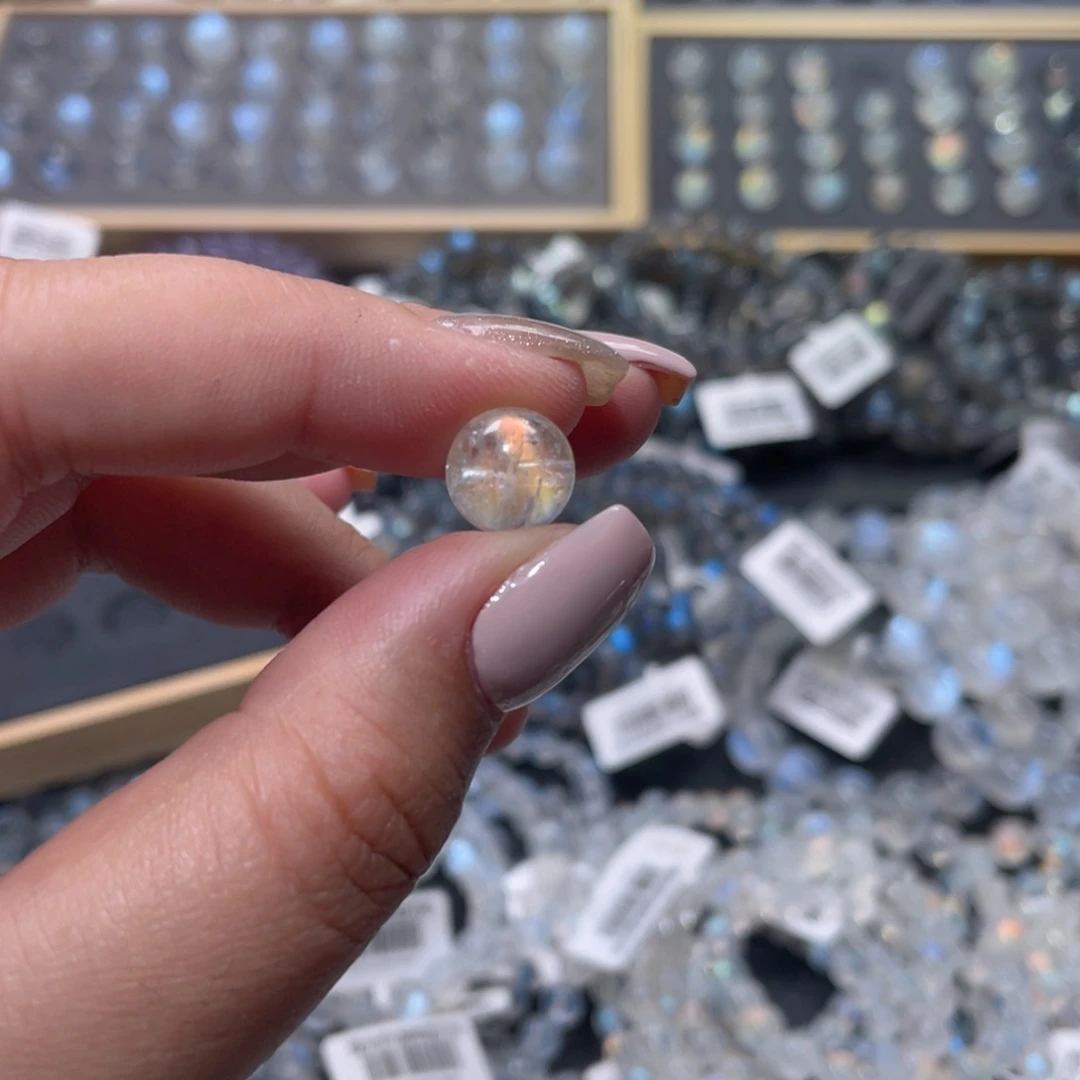 秦***关长石裸石马岛幻彩月光石单珠10mm