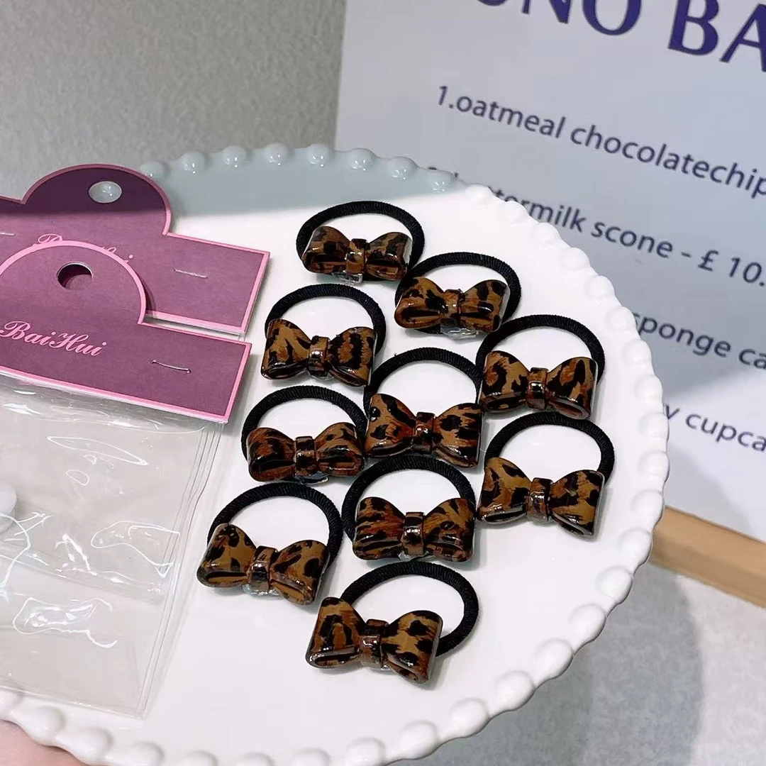 A-9901（满10米飞）bh 琥珀色豹纹蝴蝶结皮筋儿童高马尾造型 发圈