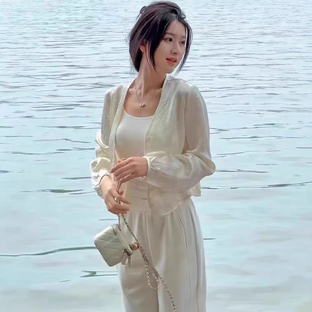 欧货V领醋酸泡泡袖长袖衬衫女2025春夏新宽松单排扣防晒外搭开衫