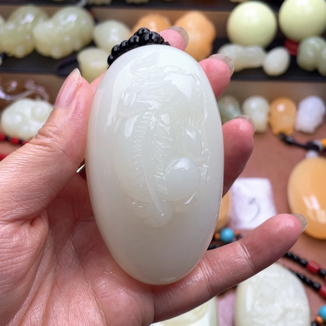 那****石材天然古青石手把件