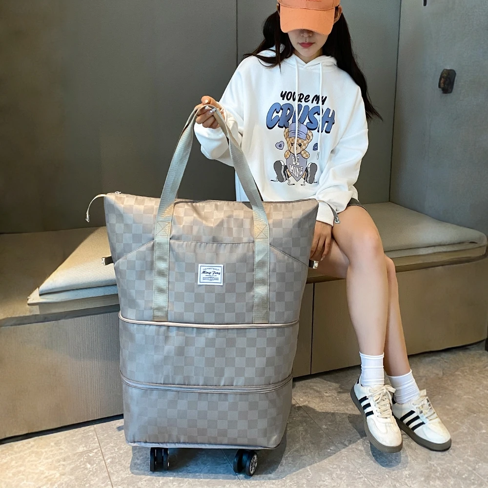 浦乐飞2025新款万向轮旅行大容量防水耐脏手提包行李包收纳待产包