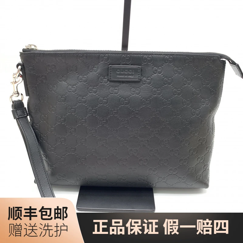 95新 GUCCI/古驰 古驰黑老花压印手拿包/J11943奢侈男士时尚 休闲