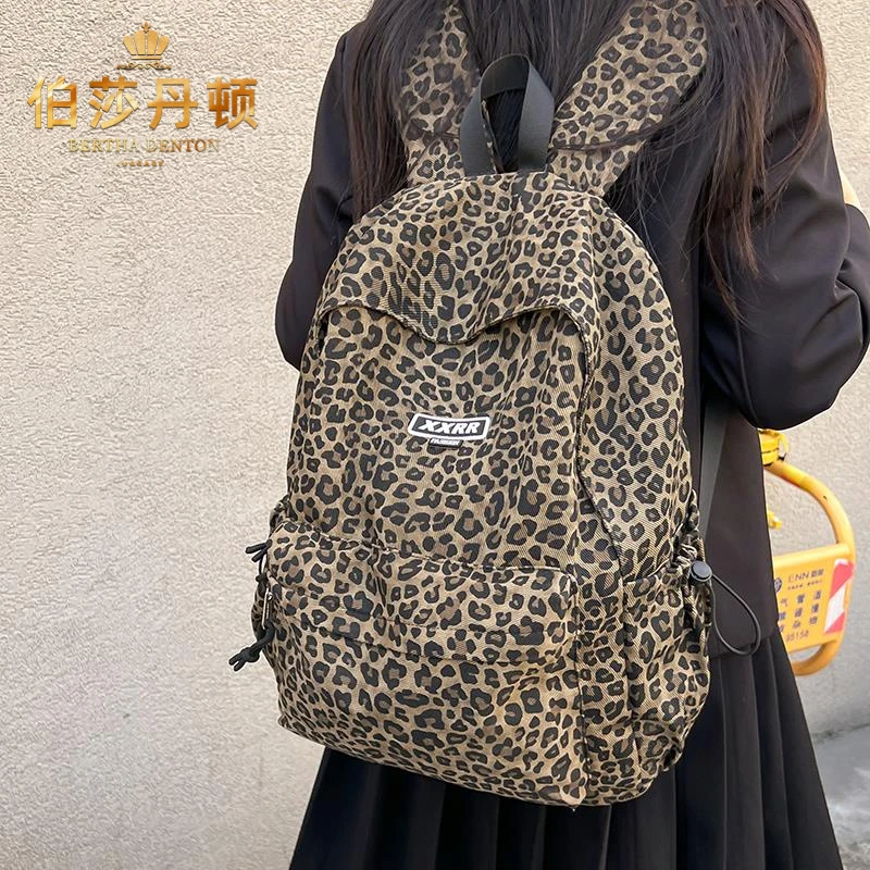 伯莎丹顿初中生书包女小学生大容量帆布背包轻便简约高中生双肩包