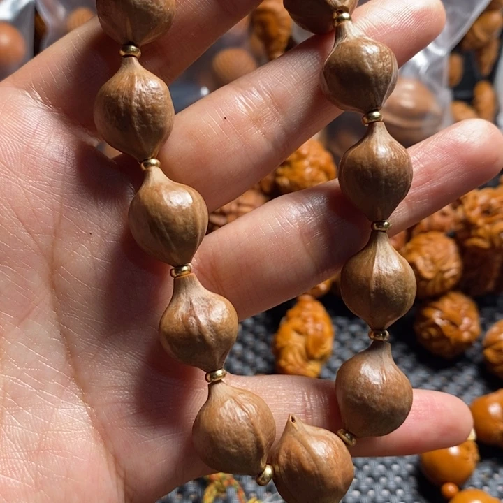 橄榄核吊坠?****?蜜桃臀手串