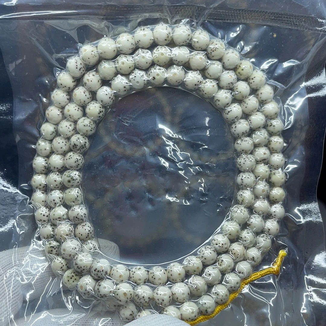 为***亮手串星月菩提7圆珠，瓷白贯穿留白