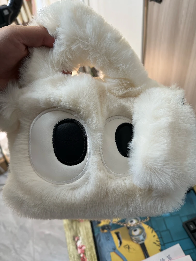 女士小香包包款式随机发。