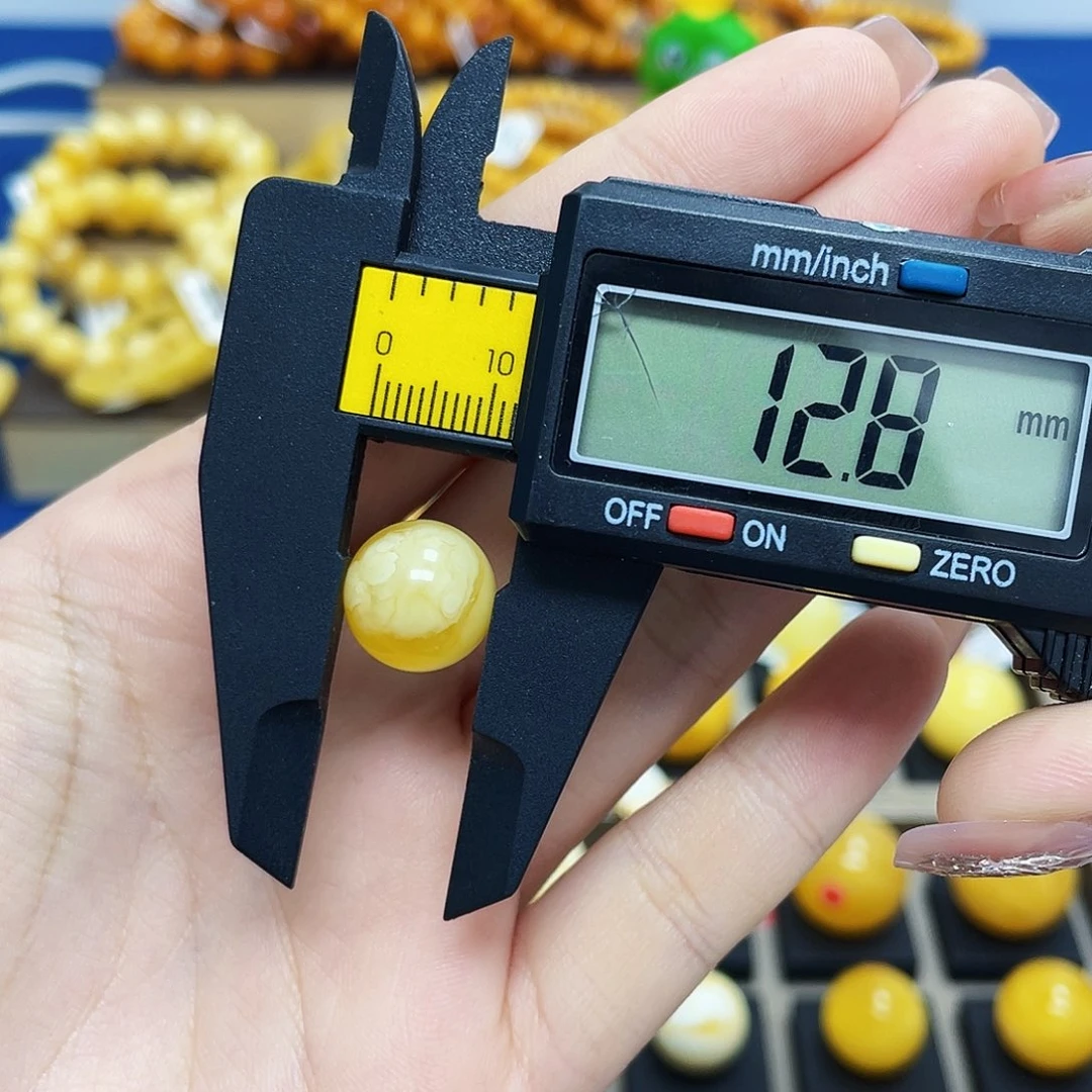 未镶嵌蜜蜡珠宝奇石孙**甜12.8mm瑕