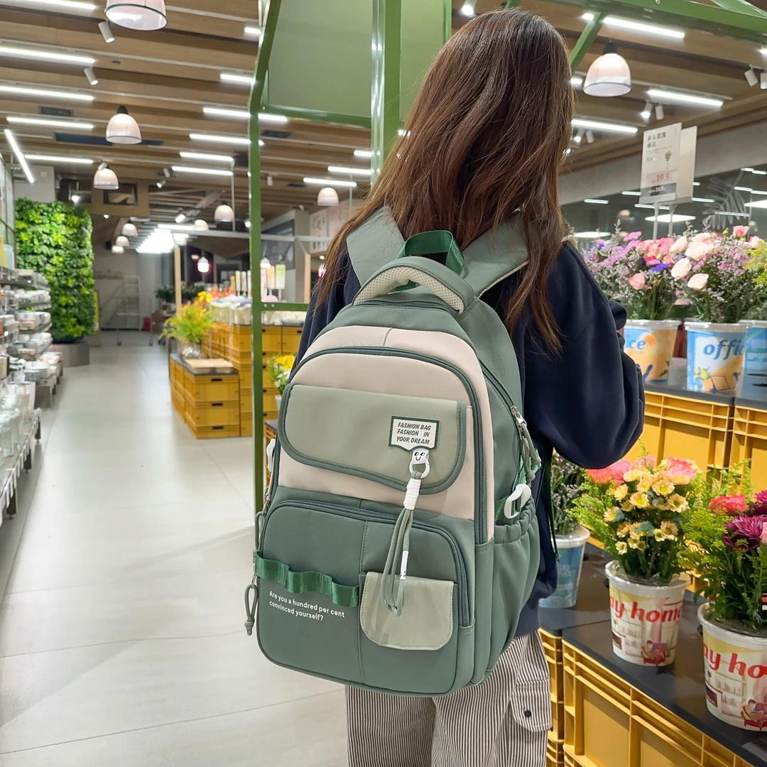 书包女初中高中生大容量中小学生四五六年级高颜值防水双肩背包潮