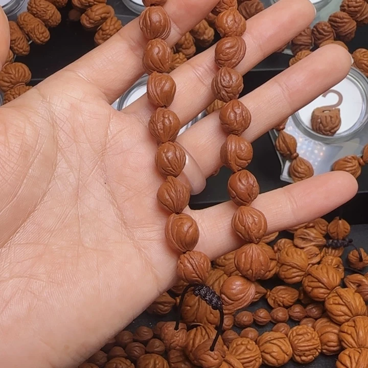 幸***来手串桃核龙纹桃核