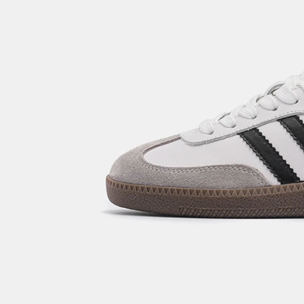 经典时尚薄底运动板鞋真皮透气休闲阿甘鞋百搭平底复古德训鞋