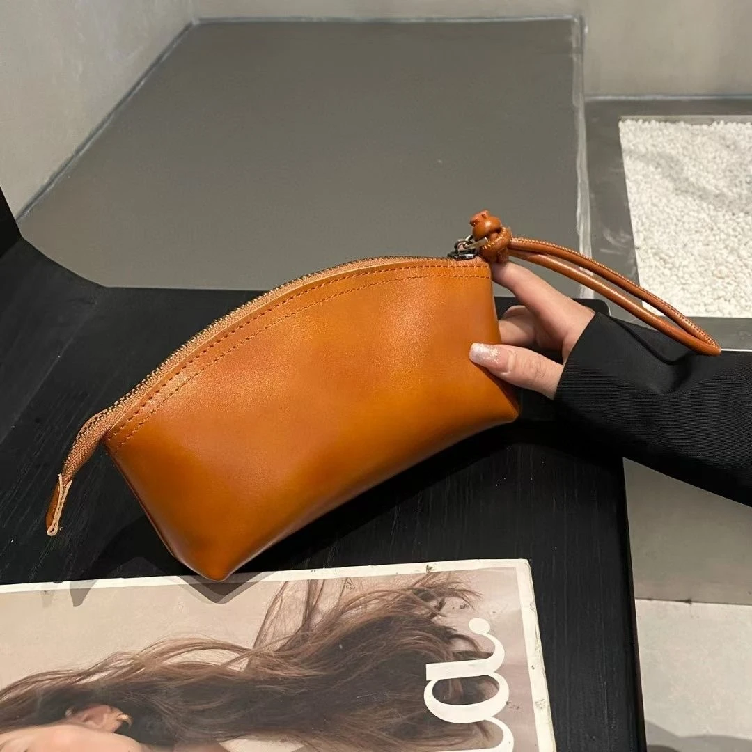 2025春季新款手拿包大容量贝壳零钱包便携手拎包手机包