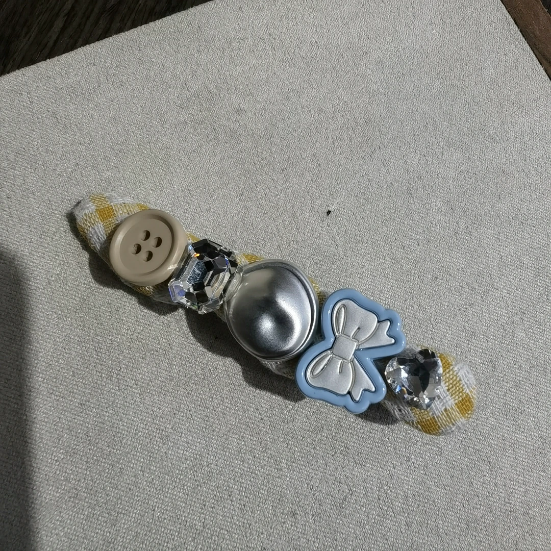 F456蓝色蝴蝶结纽扣格子边夹