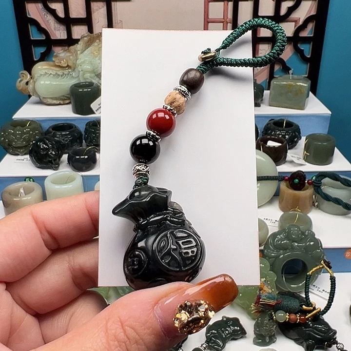 蛇纹石玉未镶嵌戒指挂链 钱袋
