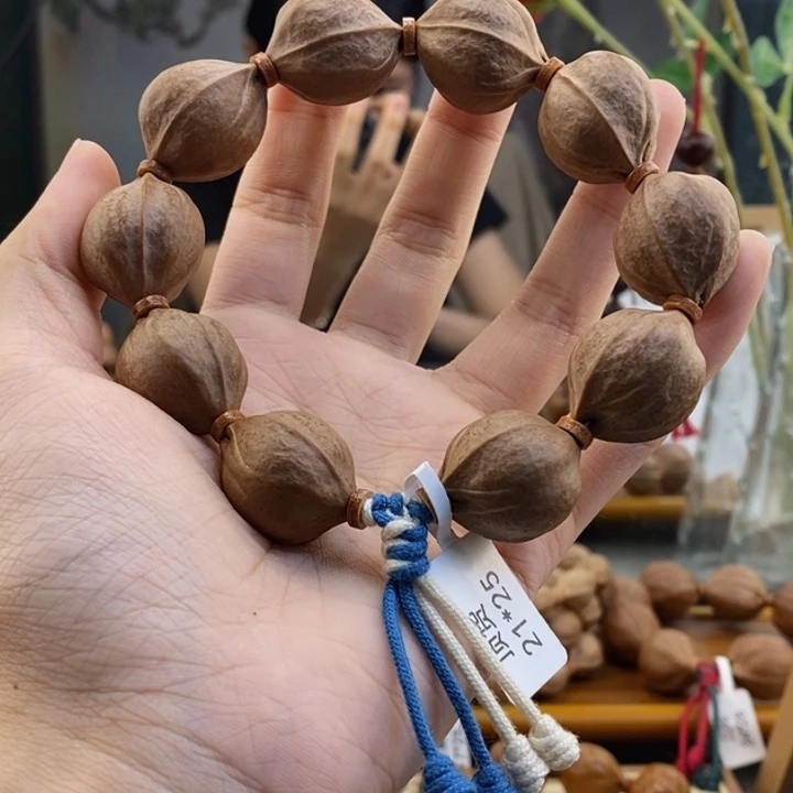 吊坠橄榄核雨****牛梅林铁