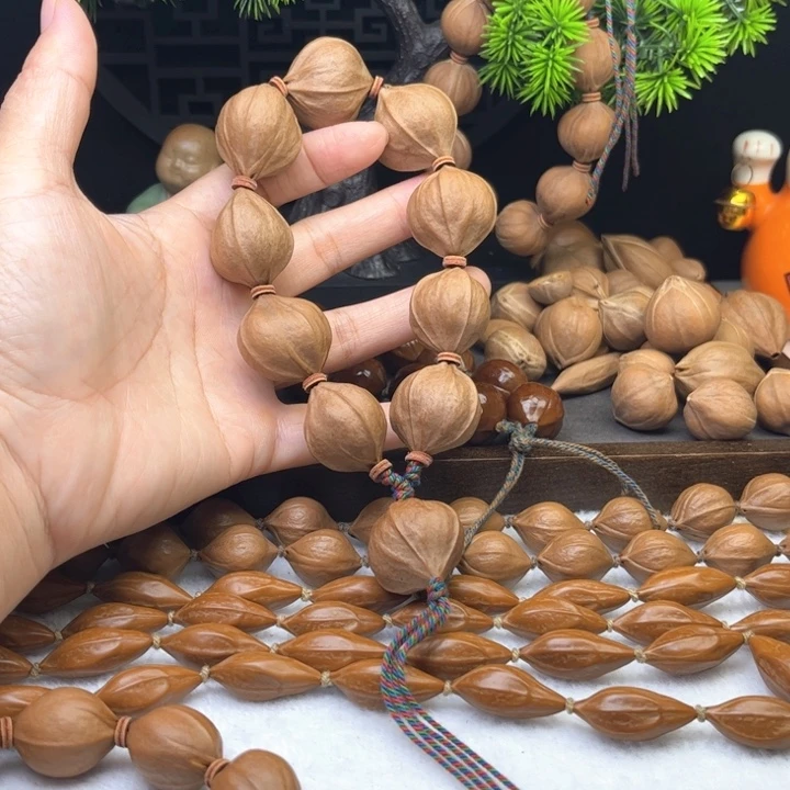 凯***粮橄榄核手串/手链2.5*2.6原皮四花铁核10颗