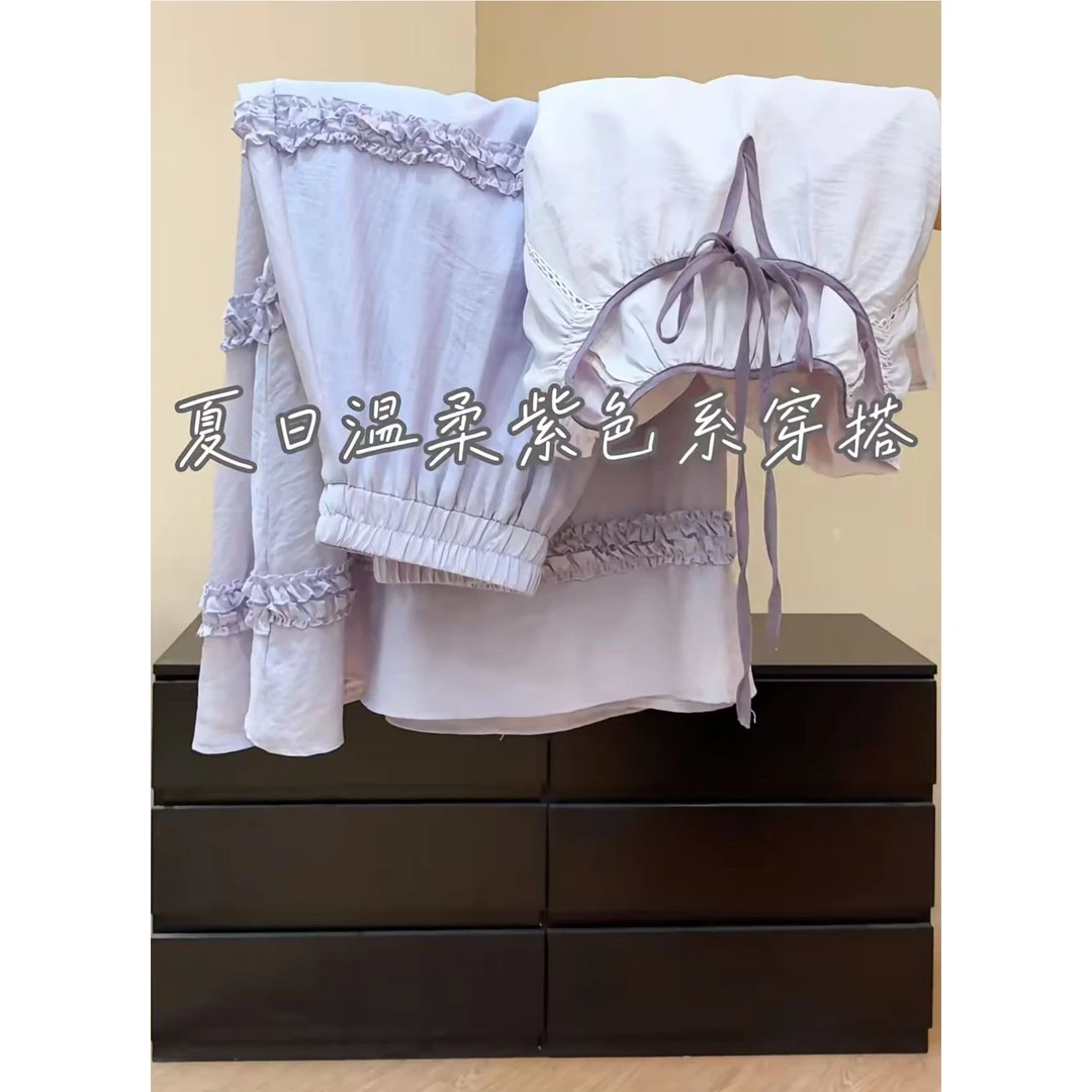 今年流行穿搭一整套2025夏季新款温柔绑带上衣木耳边半身裙两件套