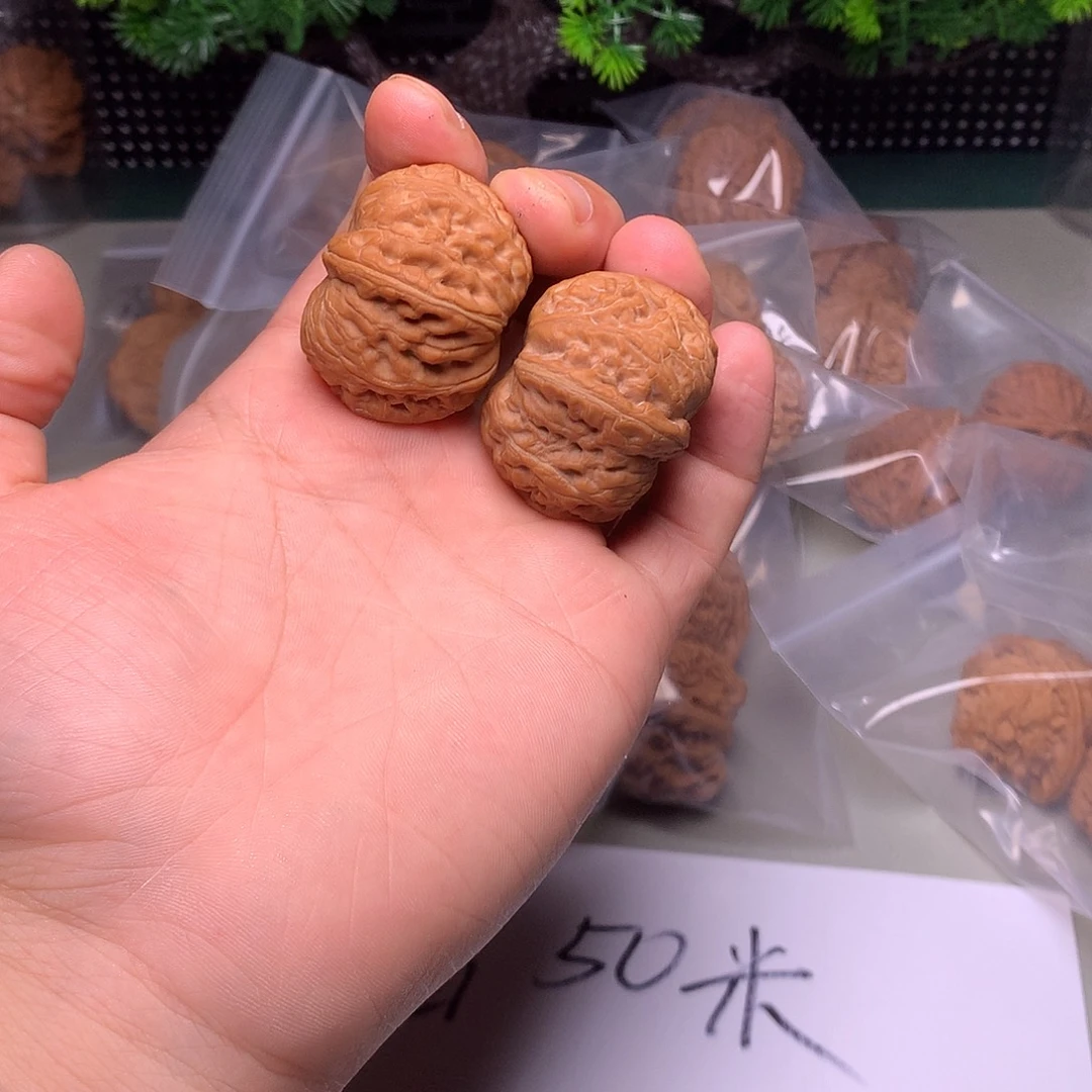 文玩核桃吊坠元宝